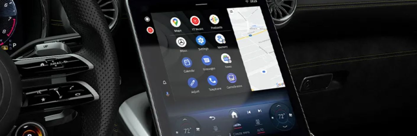 close up of a Mercedes-Benz steering wheel and infotainment with Android Auto™