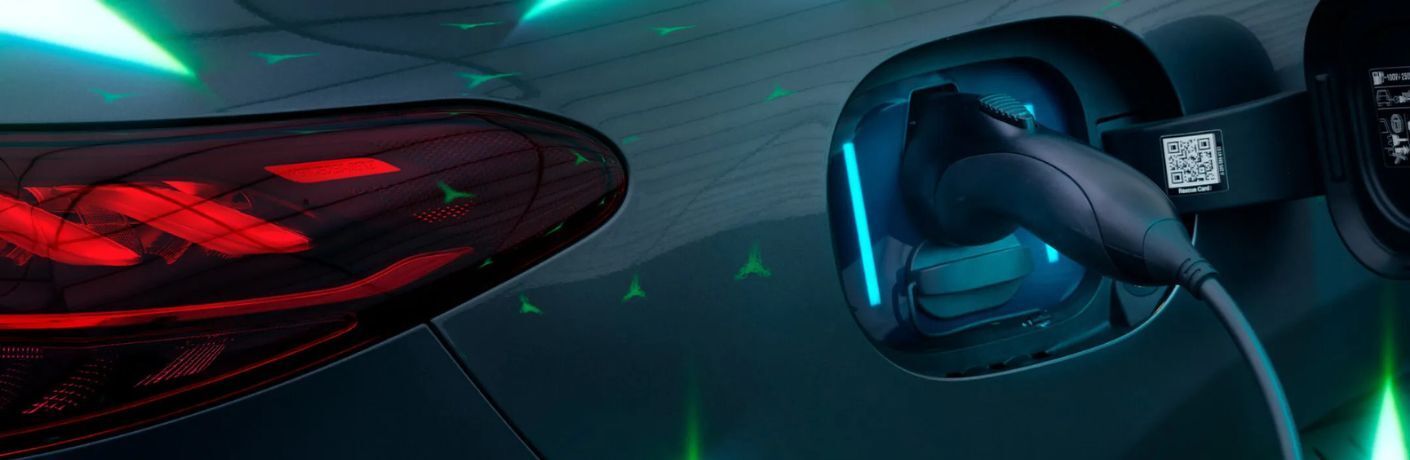 A Mercedes-Benz vehicle plugged in close up