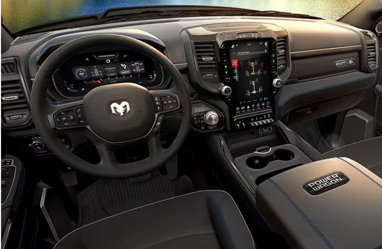 interior steering and dashboard of the 2024 Ram 2500