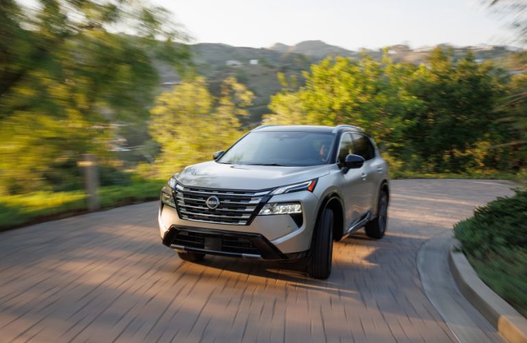 used Nissan SUV front view on a road