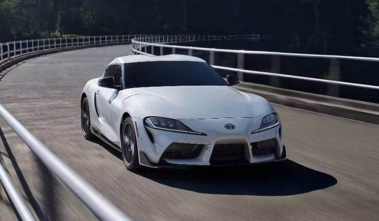 teal 2019 Toyota Corolla Hatchback parked in parking lot