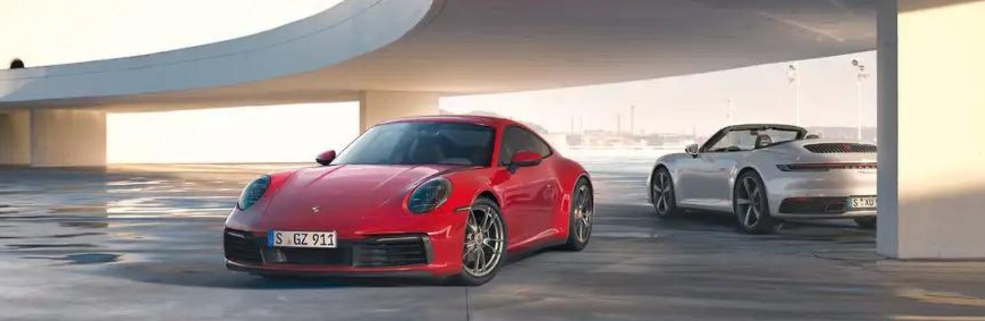 Two 2024 Porsche 911 Carrera front and rear look
