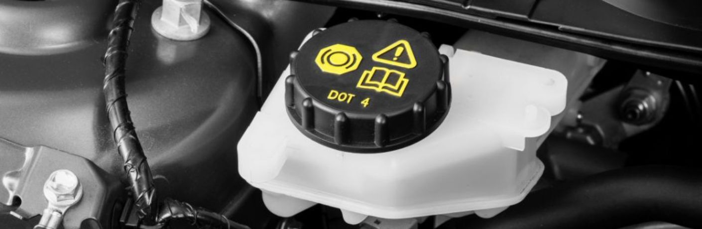 Representative image showing the opening of the brake fluid container