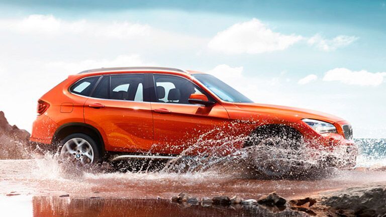 Used BMW X1 2015 model orange exterior