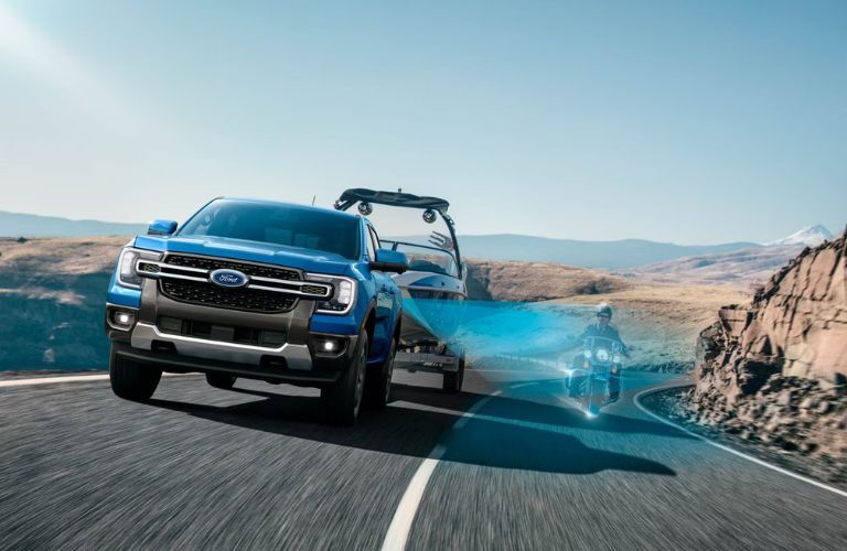 2026 Ford Ranger XLT towing a boat
