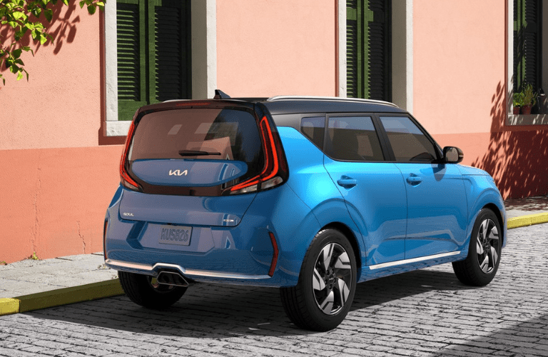 Back view of the 2025 Kia Soul parked in front of a building