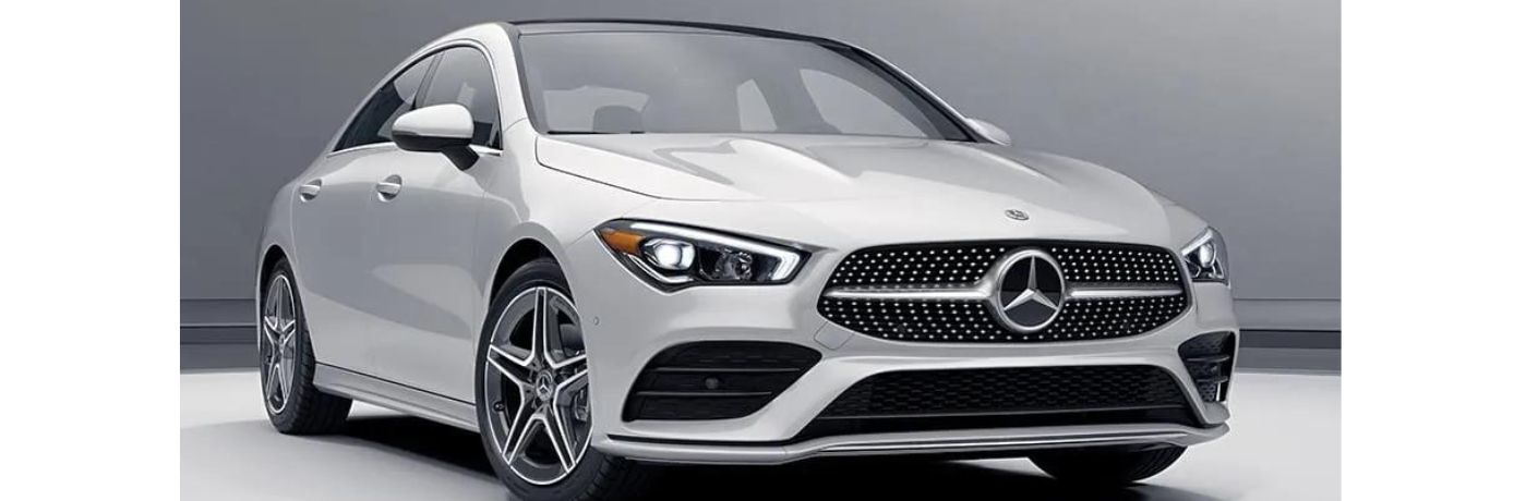 One white color 2023 Mercedes-Benz CLA is parked.