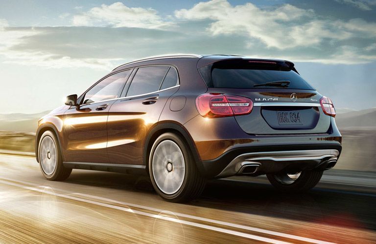 2015 MB GLA exterior back fascia driver side on blurred road