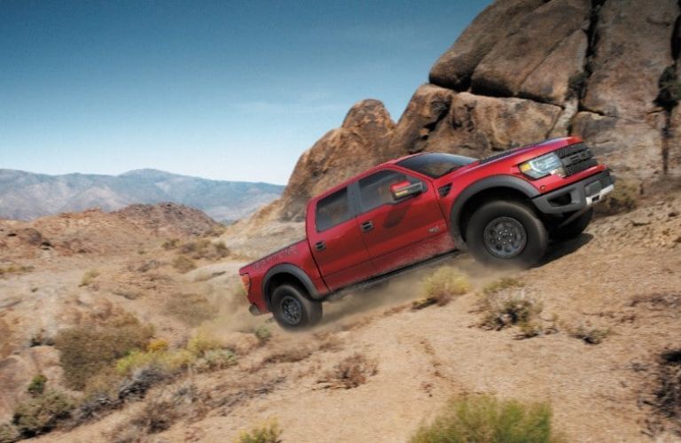 A 2013 Ford F-150 scaling a rugged hill