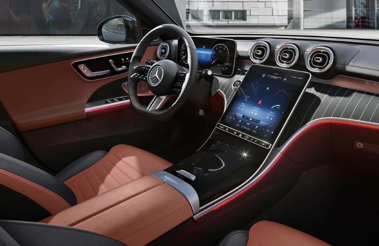 interior steering and dashboard view of a Mercedes-Benz C-Class Sedan