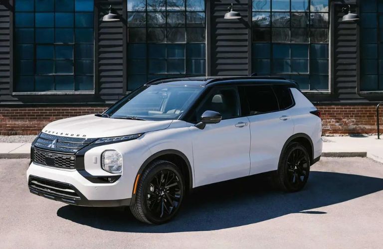 2024 Mitsubishi Outlander parked outside a building