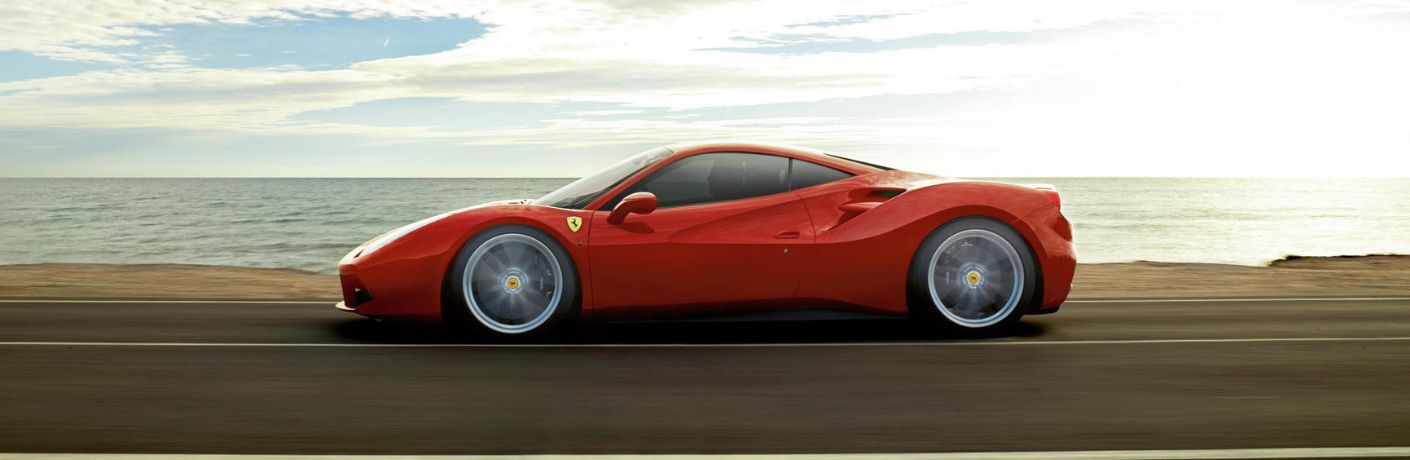 Ferrari 488 GTB on a highway near a lake