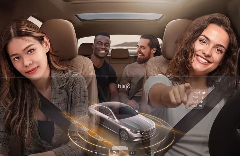 People in a Mercedes-Benz car
