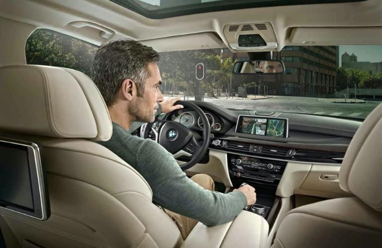 BMW vehicle driven by a man