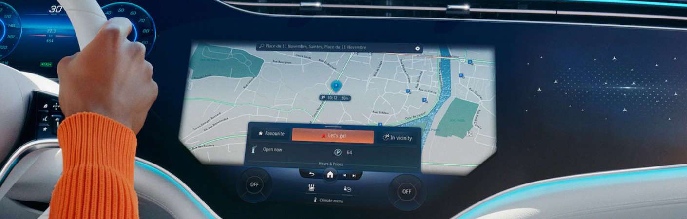 A woman using navigation in her Mercedes-Benz