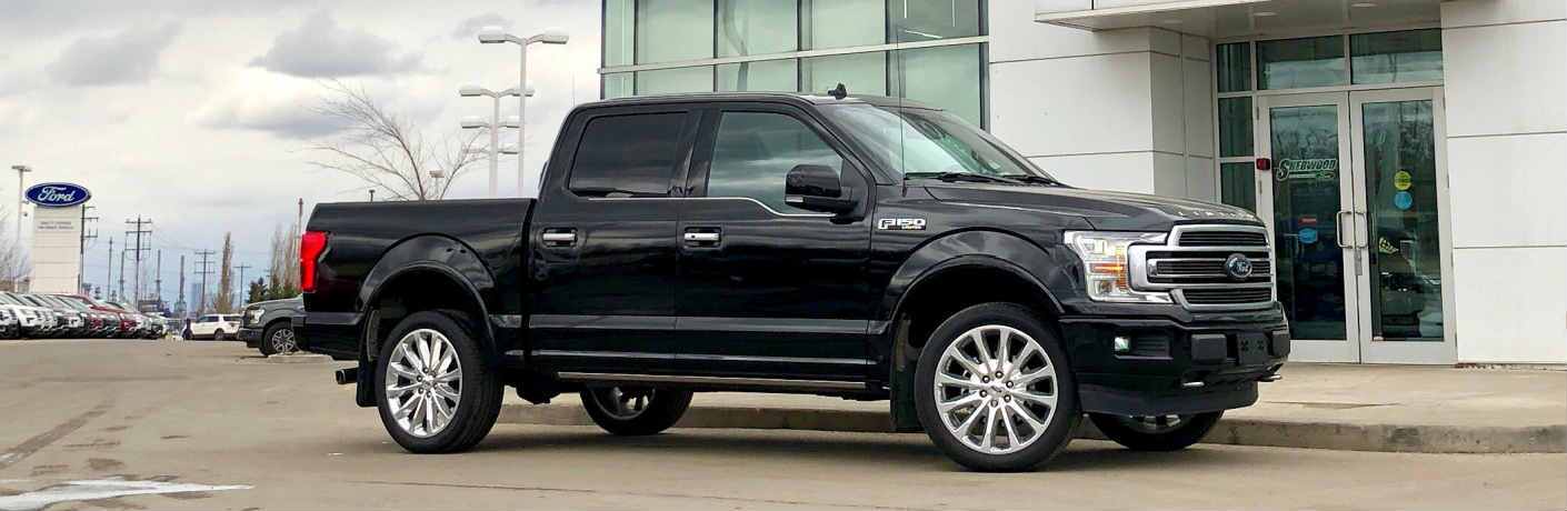 Profile view of black 2019 Ford F-150 Limited at Sherwood Ford