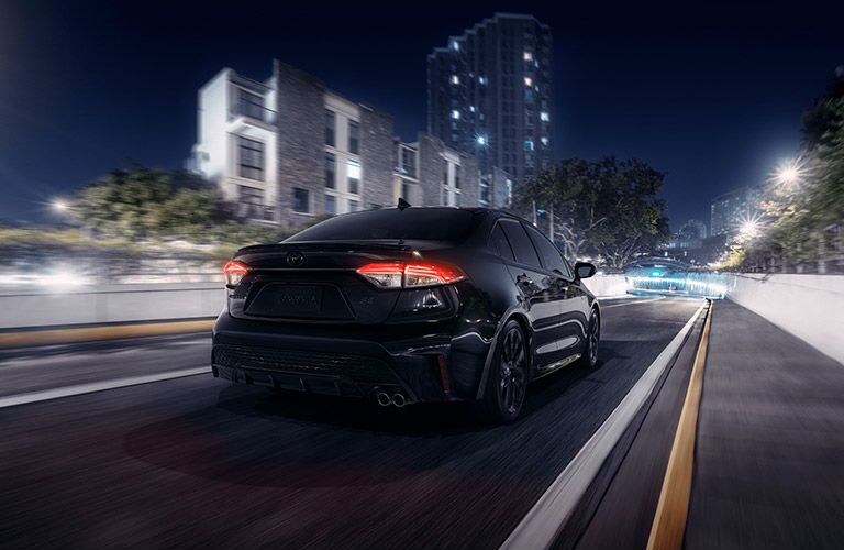 2021 Toyota Corolla black driving away at night