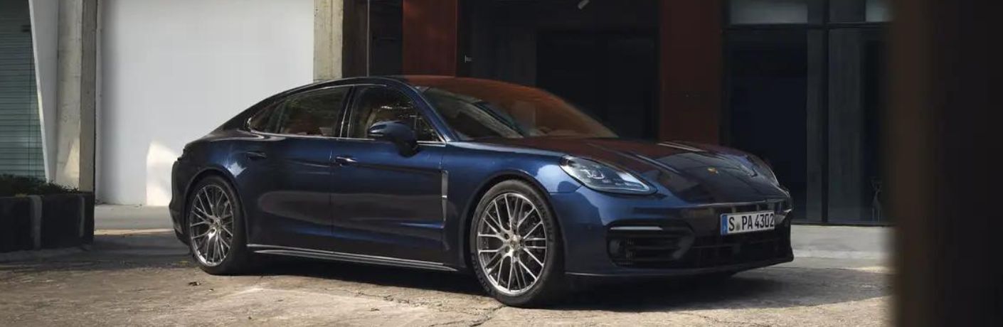 2022 Porsche Panamera parked in front a building