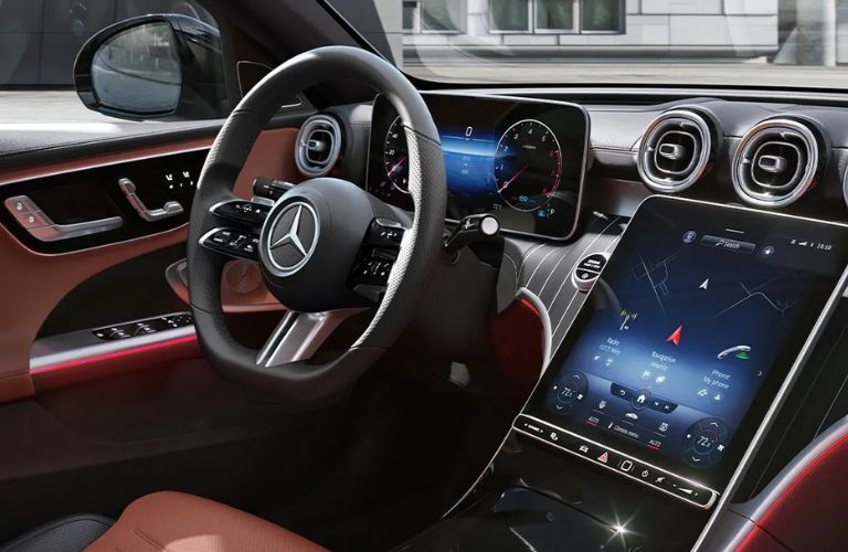 2025 Mercedes-Benz C-Class Sedan steering wheel and touchscreen