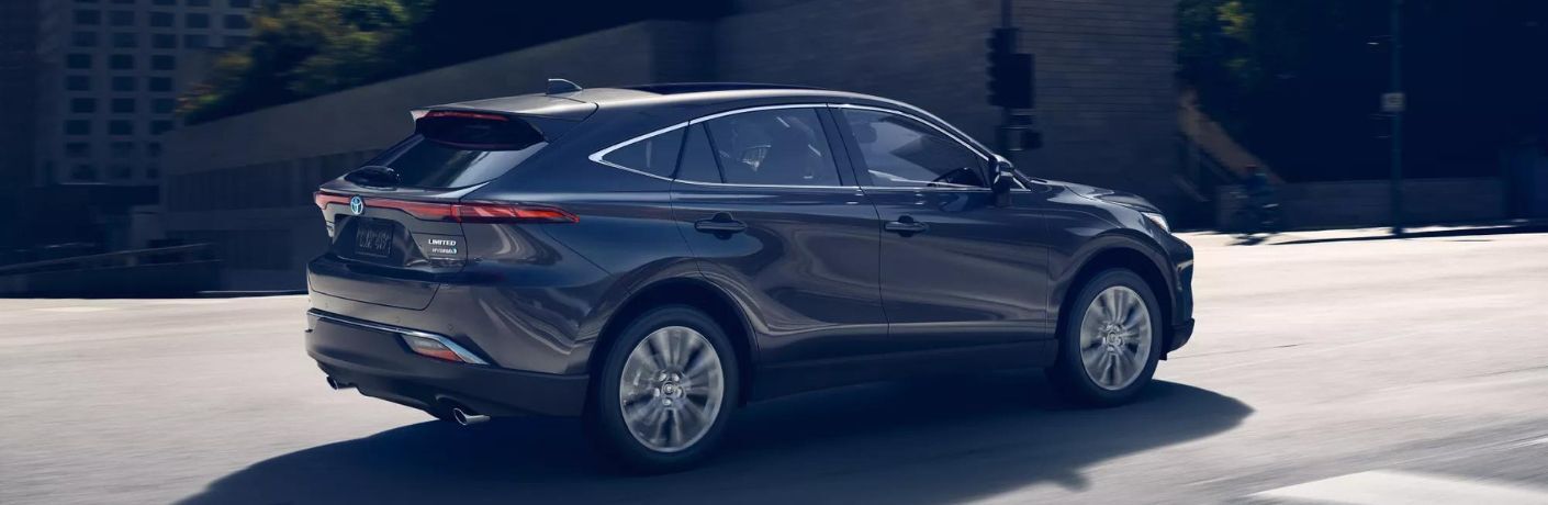 One grey color 2022 Toyota Venza is running on  the road.