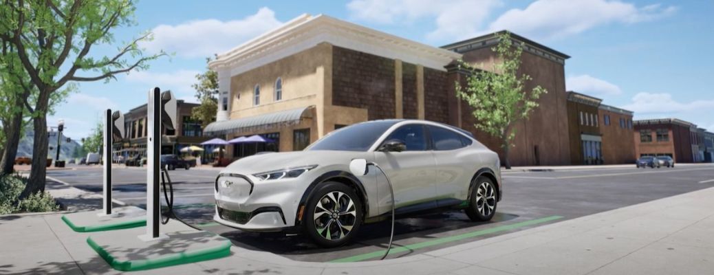 2025 Ford Mustang Mach-E at a charger
