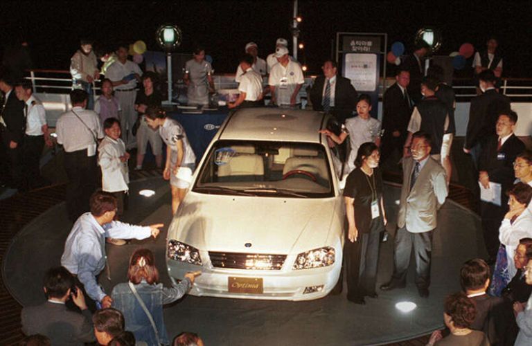 people exploring the Kia Optima as it is launched