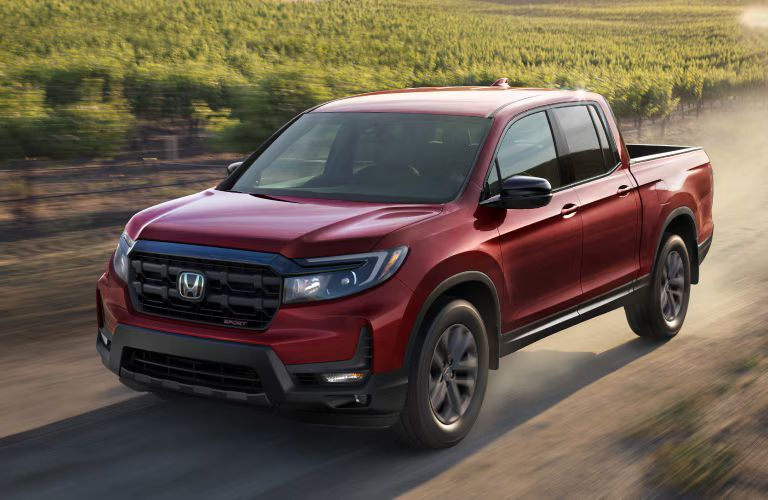 Front-quarter view of the 2025 Honda Ridgeline Red