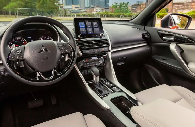 interior steering and dashboard of the 2024 Mitsubishi Eclipse Cross
