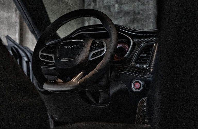 The steering wheel of the 2023 Dodge Challenger is shown.
