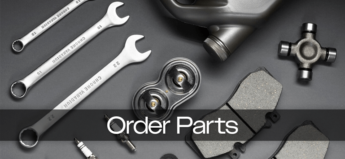 A car mechanic is working on a car