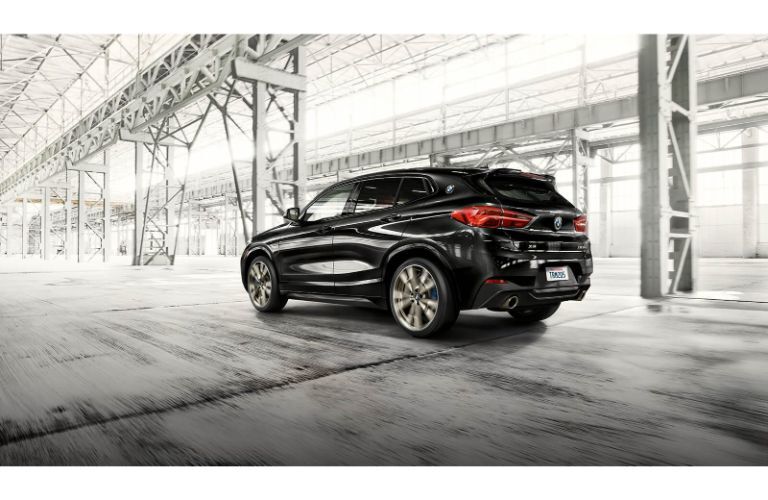 2020 BMW X2 driving in a warehouse