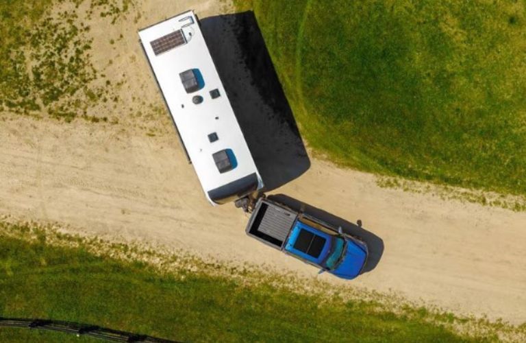 2025 Ford F-150 Platinum towing a trailer overhead view