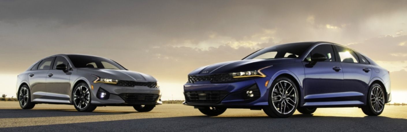 Two 2023 Kia K5 parked side by side