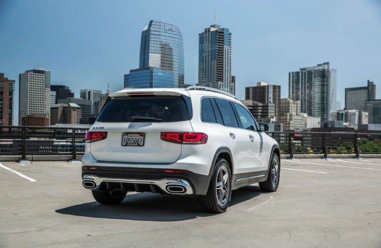 2020 MB GLB exterior back fascia and passenger side in parking lot in front of city