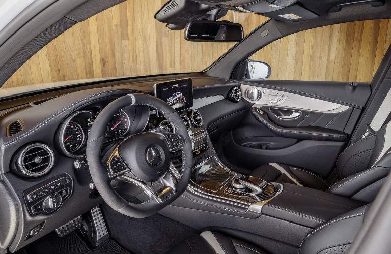 A photo of the driver's cockpit in the 2018 Mercedes-Benz AMG GLE Coupe.