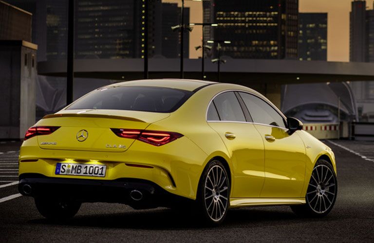 2020 MB CLA exterior back fascia and passenger side in front of city bridge