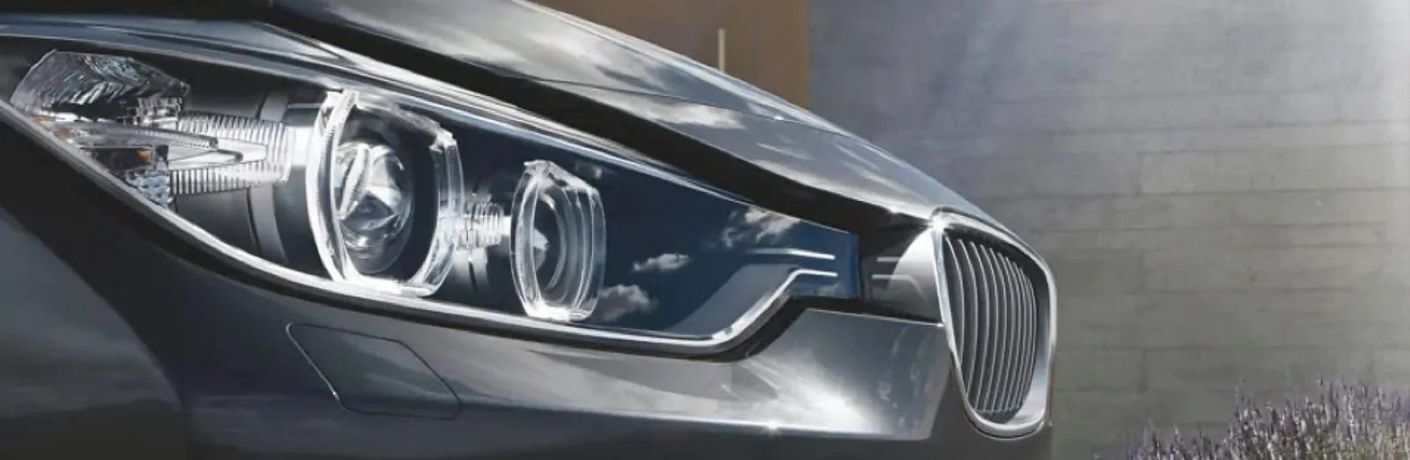 Front view of the 2023 Volkswagen Taos parked in a garden