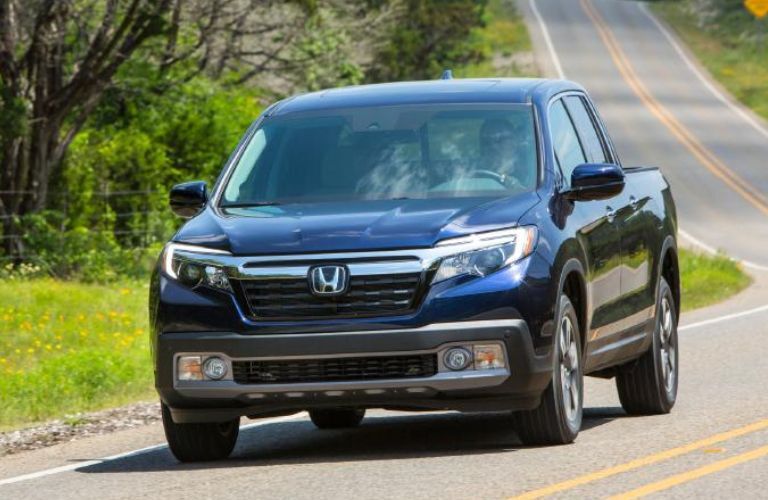A 2019 Honda Ridgeline on a smooth road