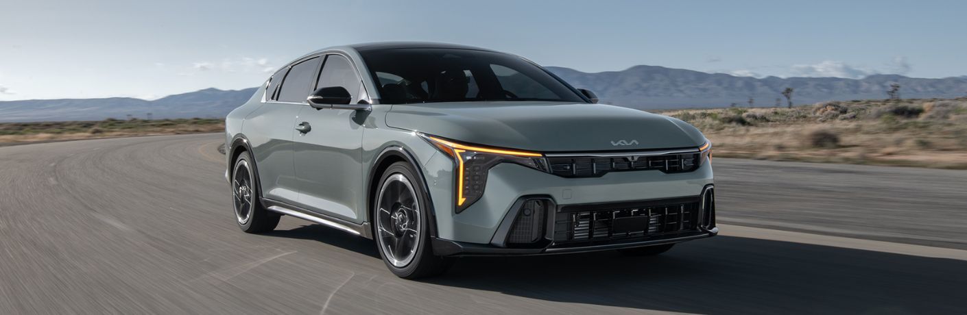 front quarter view of the 2025 Kia K4 on the road
