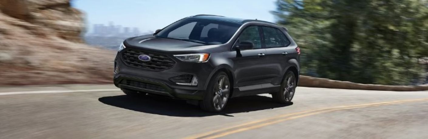 2024 Ford Edge driving on a curved road