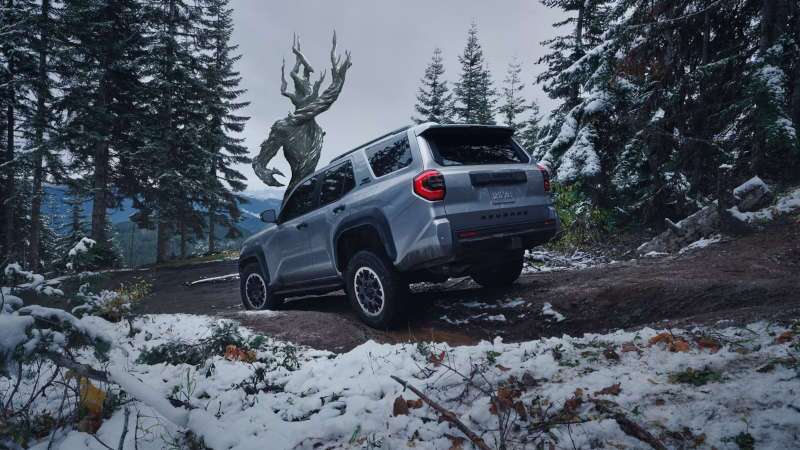 The 2026 Toyota 4Runner driving off-road on snowy terrain