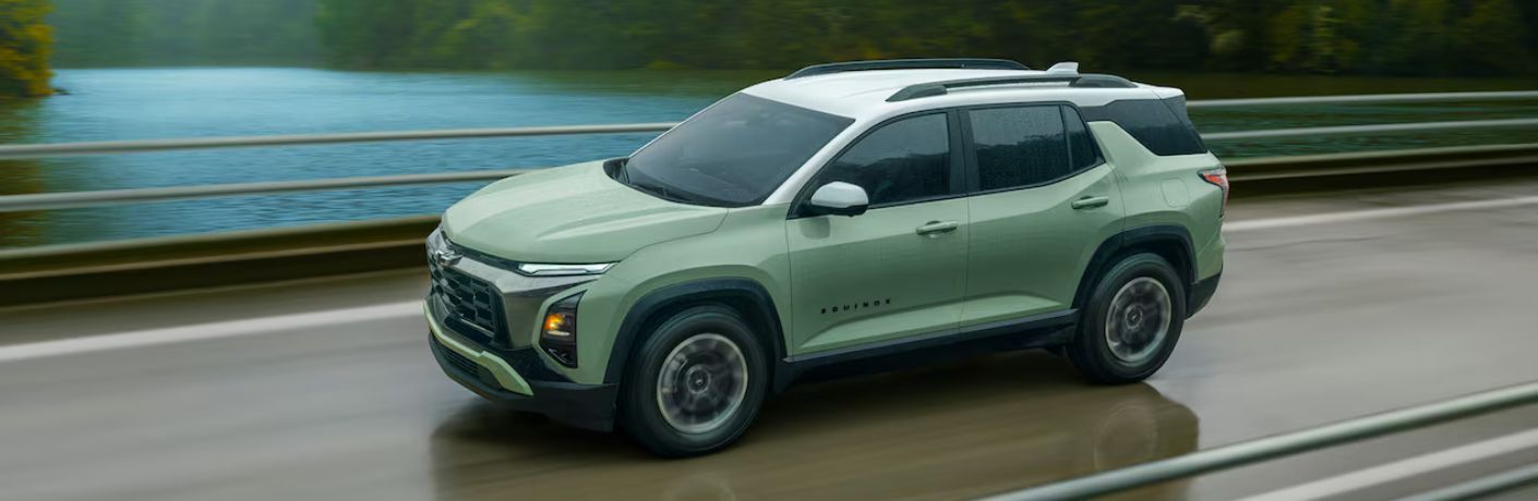 2026 Chevrolet Equinox side view on a road