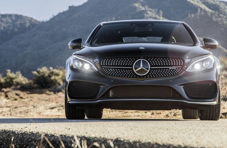 2019 Mercedes-Benz C-Clas parked in front of mountains