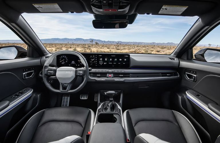 2026 Kia K4 steering wheel and dashboard