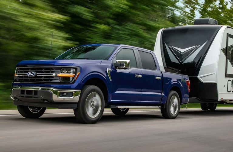 2026 Ford F-150 XL towing a trailer