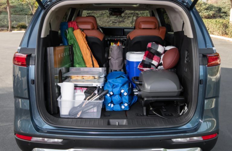 The open trunk of a 2023 Kia Carnival
