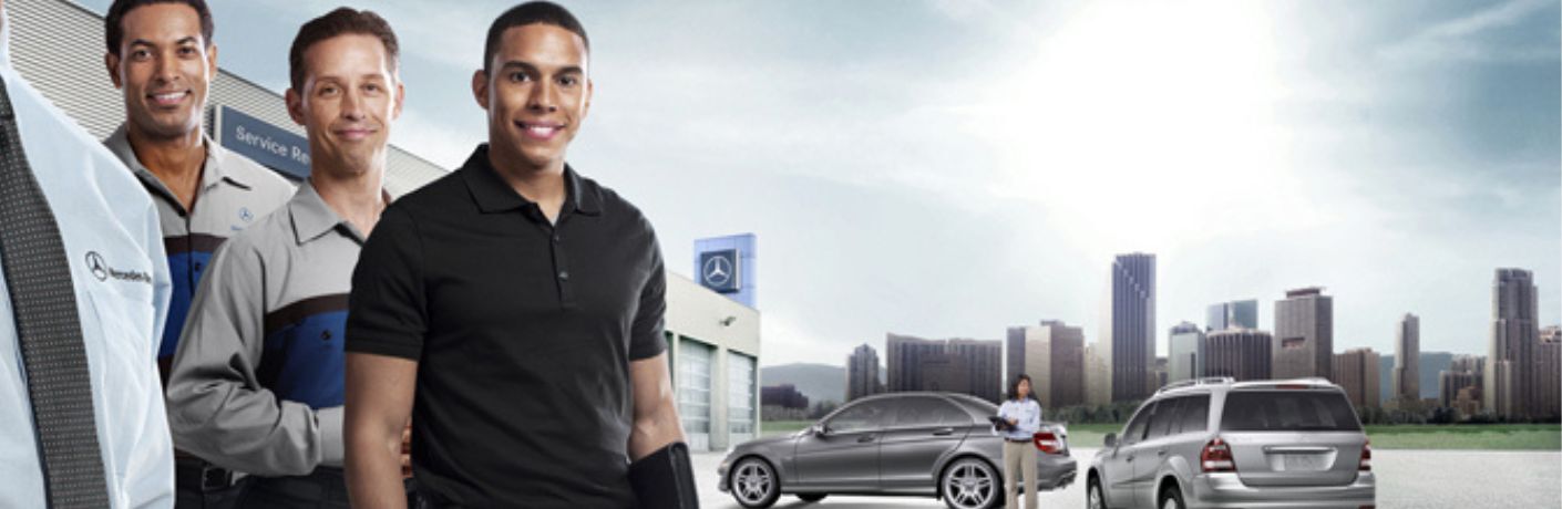 three MB technicians outside a MB service center