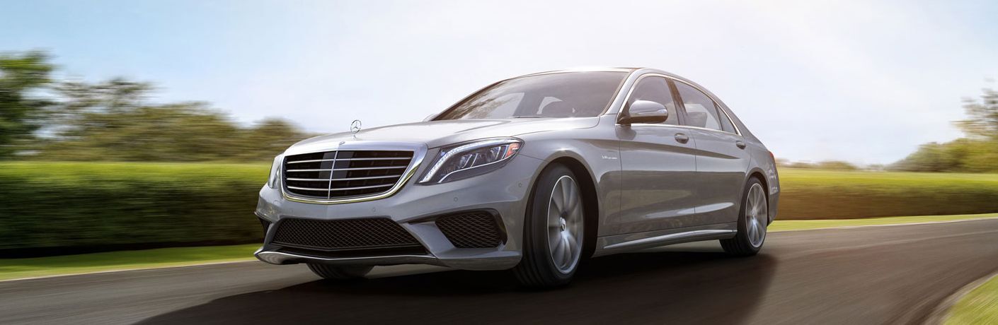 Silver 2017 Mercedes-Benz S-Class Driving Down Road