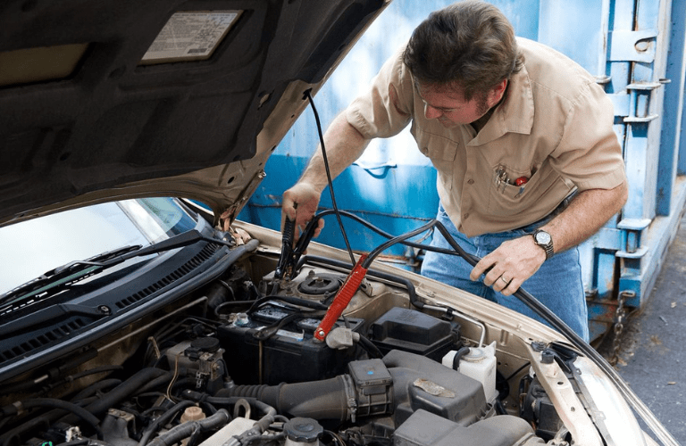 Mechanic repairing the vehicle