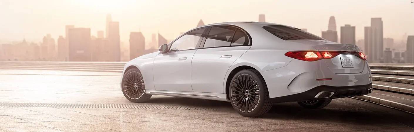 A split pane view of the front and rear exterior of the 2025 Mercedes-Benz E 450 4MATIC® Sedan near Scottsdale